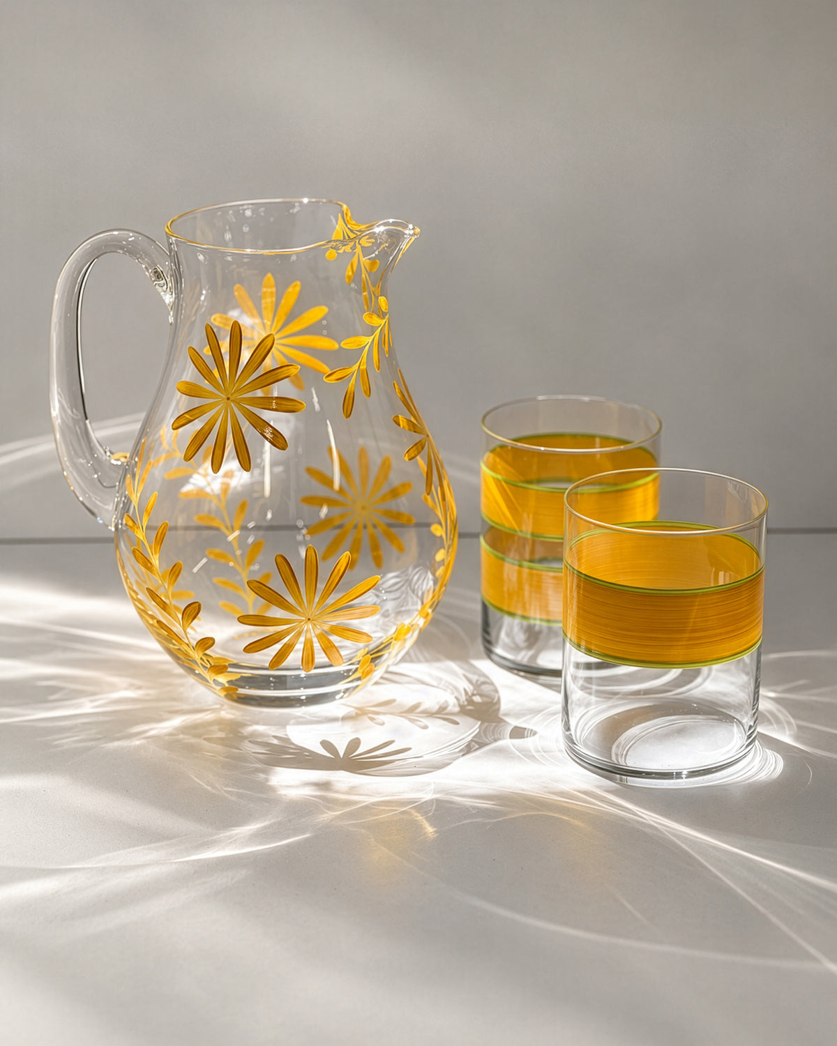 Saint Tropez II Jug & Oaxaca Tumblers · glassware hand-painted in yellow · Los Vasos de Agua Clara